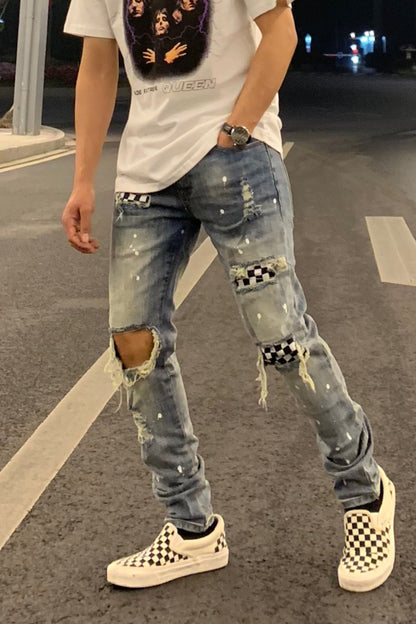 Ripped high street style checkerboard patch denim trousers