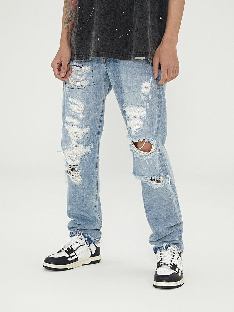 Distressed Washed Retro Light-colored Jeans With Ripped Raw Edges