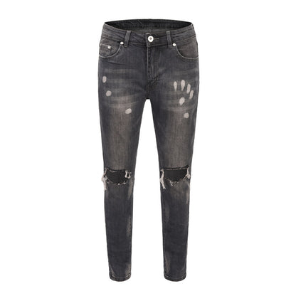 High street kanye spray-painted knee-cut slim-fit jeans