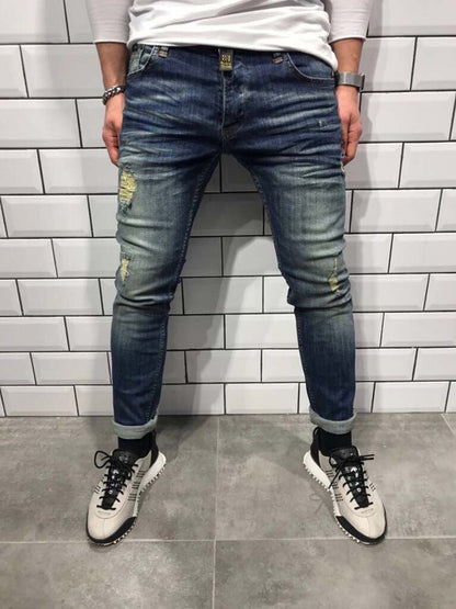 Men's hole small feet jeans Europe and the United States new denim trousers