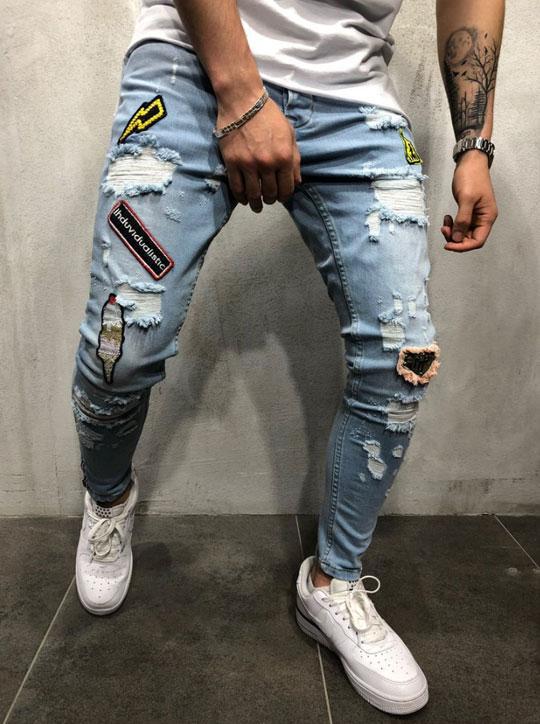 Blue ripped logo jeans