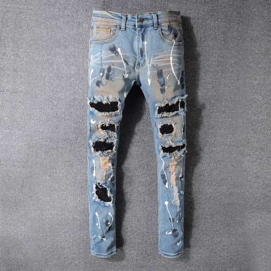 Ripped Men's Jeans Made Of Old Washed Patch